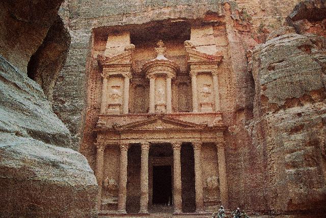 A Building Of Petra On The Side Of A Mountain